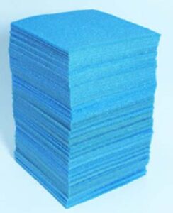 A stack of aqua colour VCI non-abrasive cushion foam